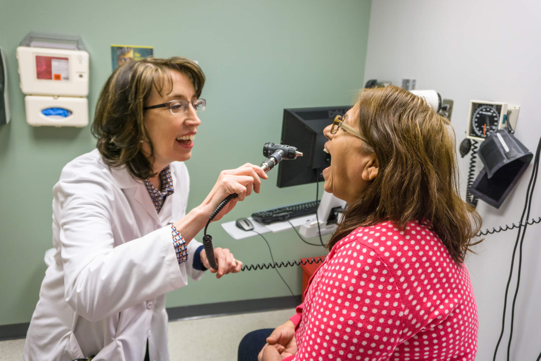 Doctor checking a patient's teeth