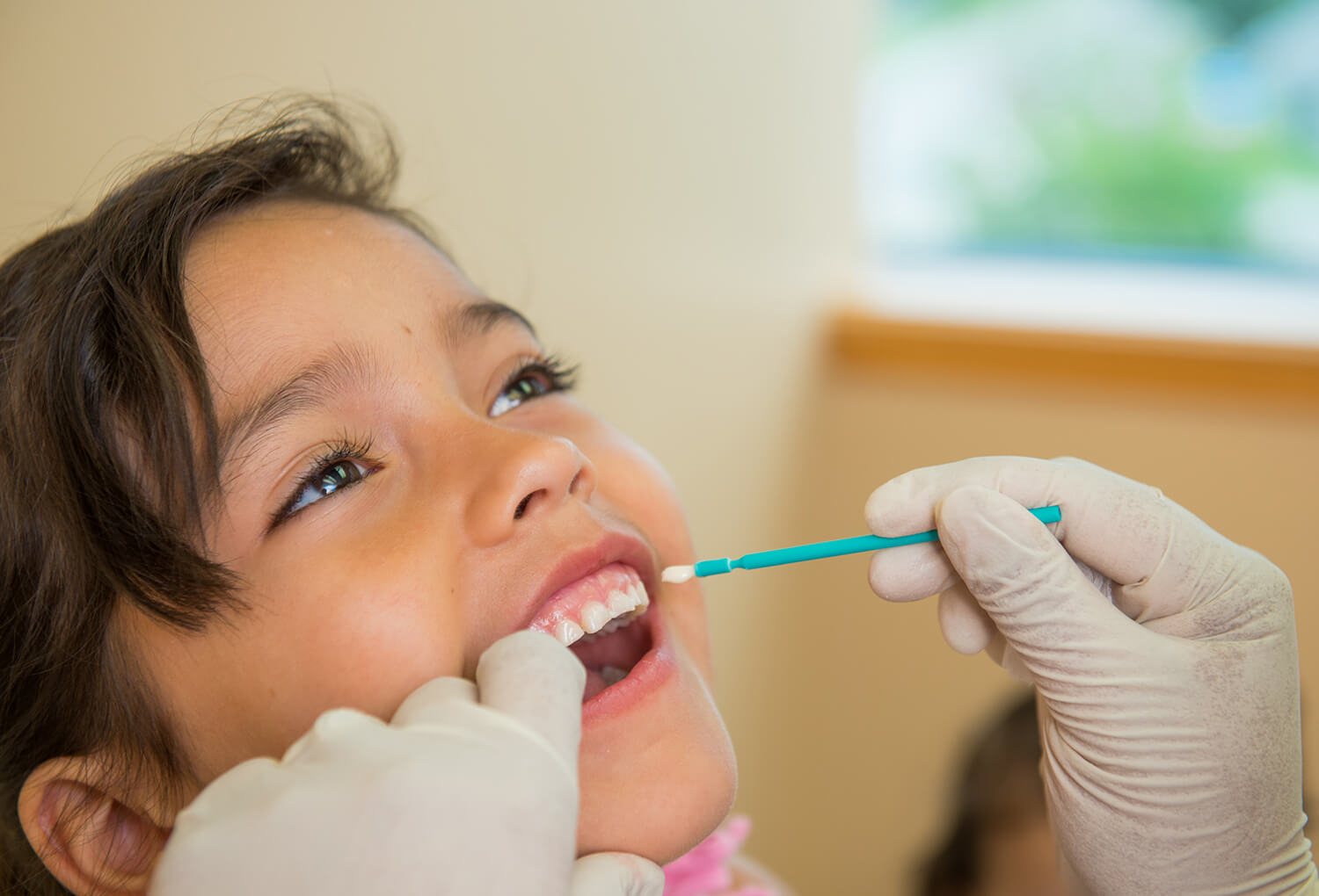 Child getting teeth checked